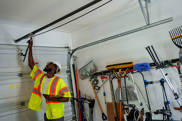 Professional Garage Door Panel Replacement technician working in Strafford County County, NH